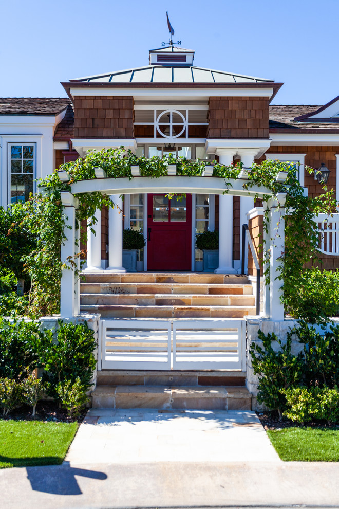 Inspiration for a coastal entryway remodel in Orange County