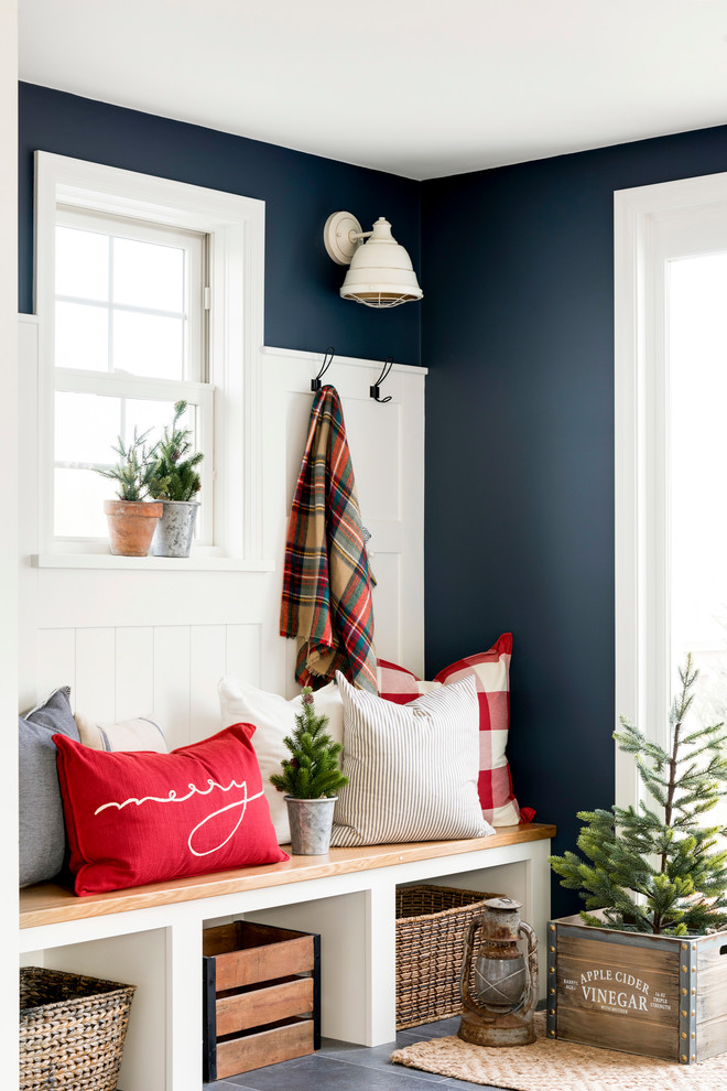 Entryway - mid-sized country gray floor entryway idea in Minneapolis with blue walls and a white front door