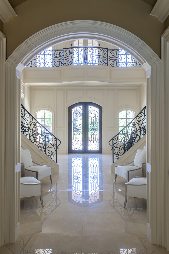 Inspiration for a traditional entrance in Dallas with marble flooring.