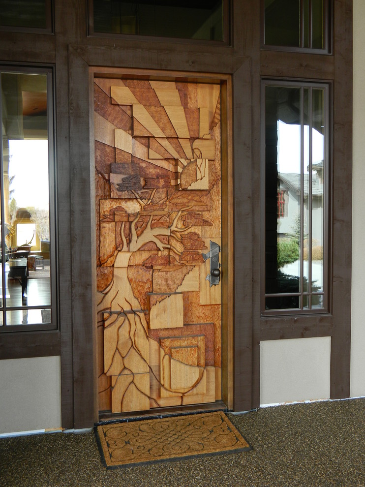Large asian dark wood floor entryway photo in Denver with brown walls and a medium wood front door