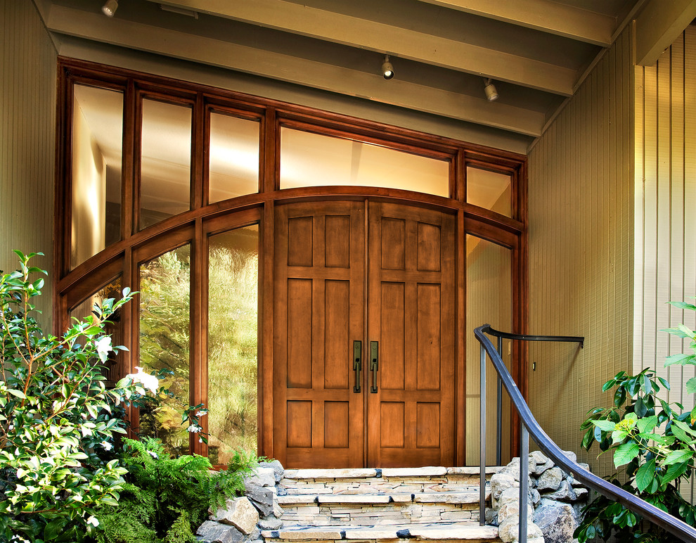 Inspiration for a contemporary entryway remodel in San Francisco with beige walls and a medium wood front door