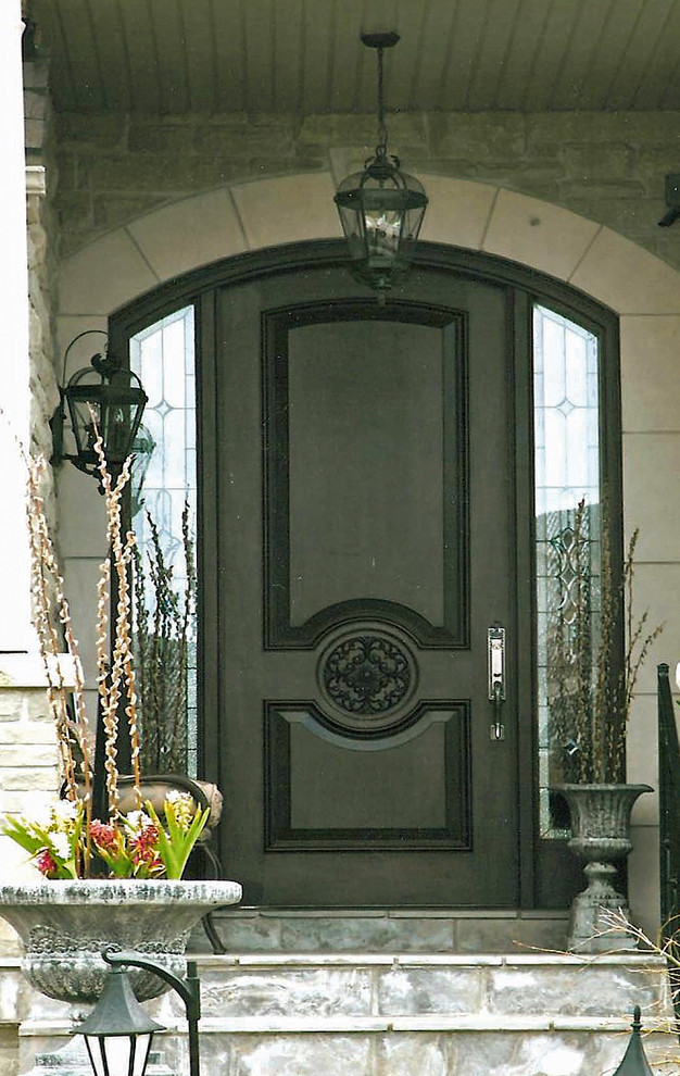 Design ideas for a medium sized traditional front door in Toronto with beige walls, a single front door, a black front door and feature lighting.
