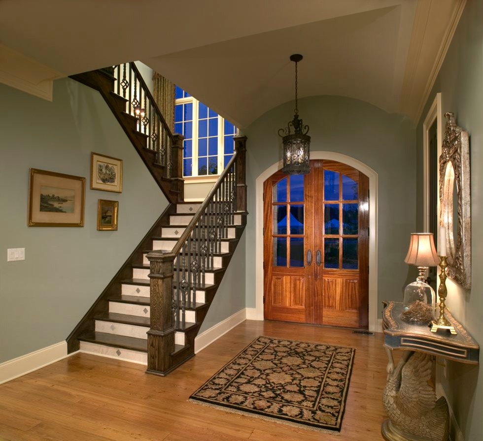 Inspiration for a large timeless light wood floor double front door remodel in Atlanta with blue walls and a medium wood front door