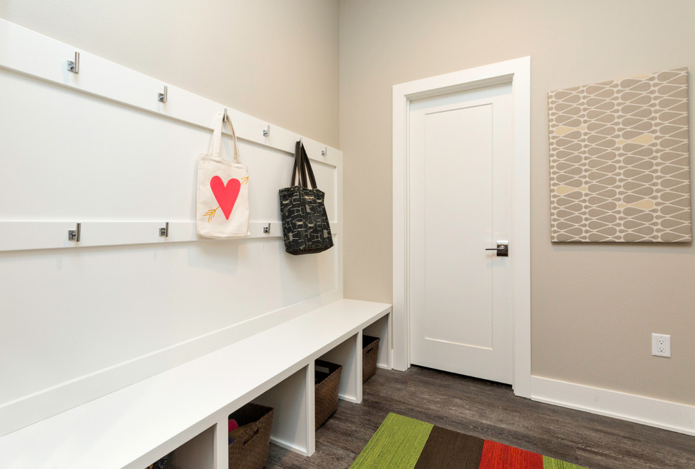 Photo of a contemporary boot room in Other with grey walls, medium hardwood flooring, a single front door and a white front door.
