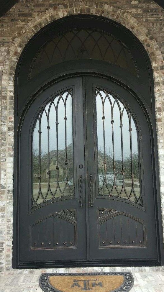 Idee per una porta d'ingresso stile rurale con una porta a due ante