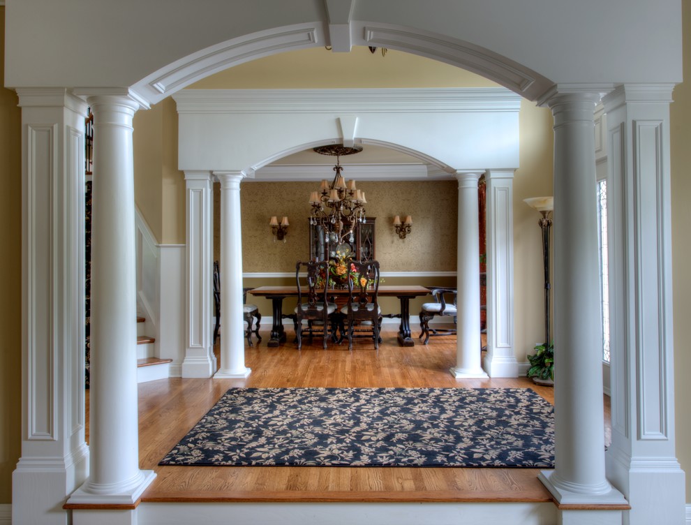Photo of a medium sized classic foyer in Dallas with beige walls, medium hardwood flooring, a single front door, a white front door and brown floors.
