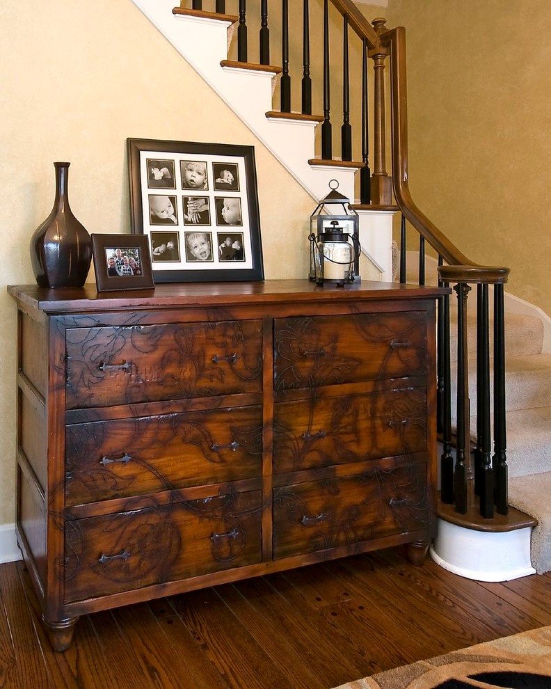 Inspiration for a medium sized traditional foyer in Louisville with beige walls and medium hardwood flooring.