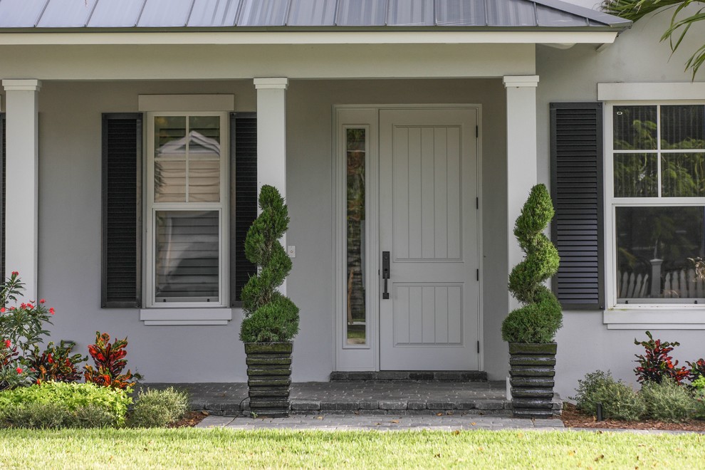 Design ideas for a classic front door in Miami with a single front door and a white front door.