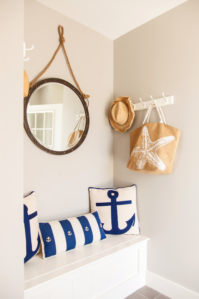 Inspiration for a small nautical foyer in Boston with grey walls, porcelain flooring, a single front door and a white front door.
