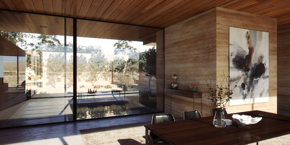 Mittelgroße Moderne Haustür mit Betonboden, Drehtür, Haustür aus Glas und beigem Boden in Orange County