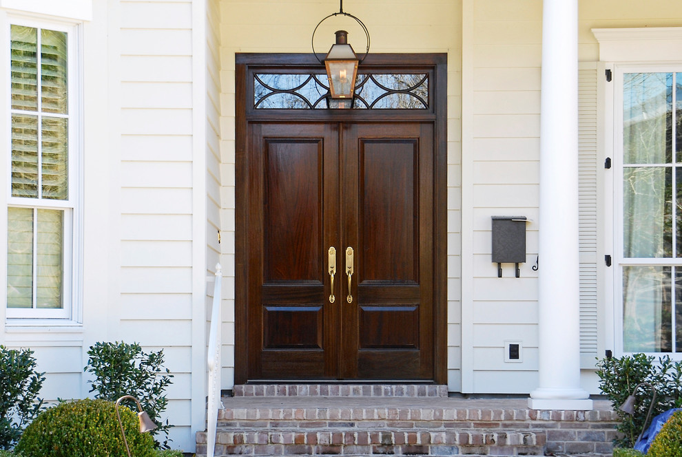 Photo of a traditional entrance in New Orleans with feature lighting.