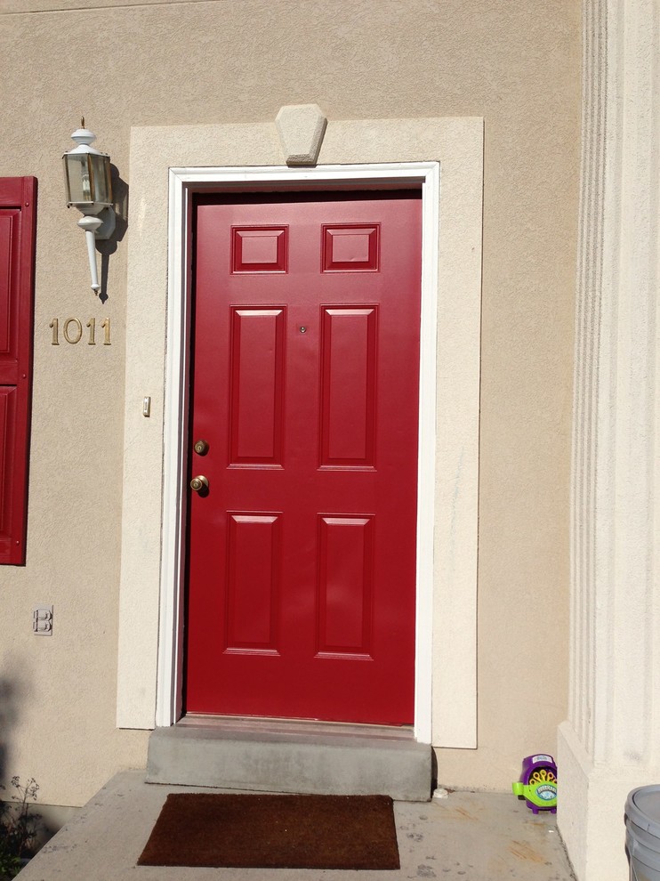 Inspiration for a medium sized contemporary front door in Austin with a single front door and a red front door.
