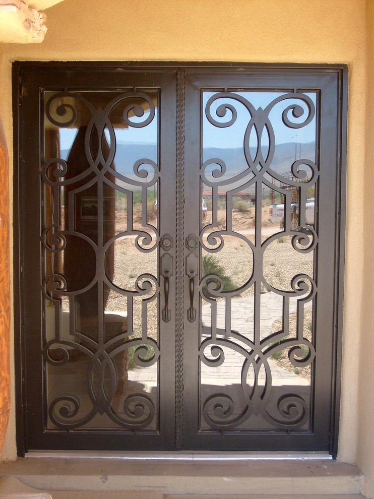 Inspiration for a classic front door in Albuquerque with a double front door.