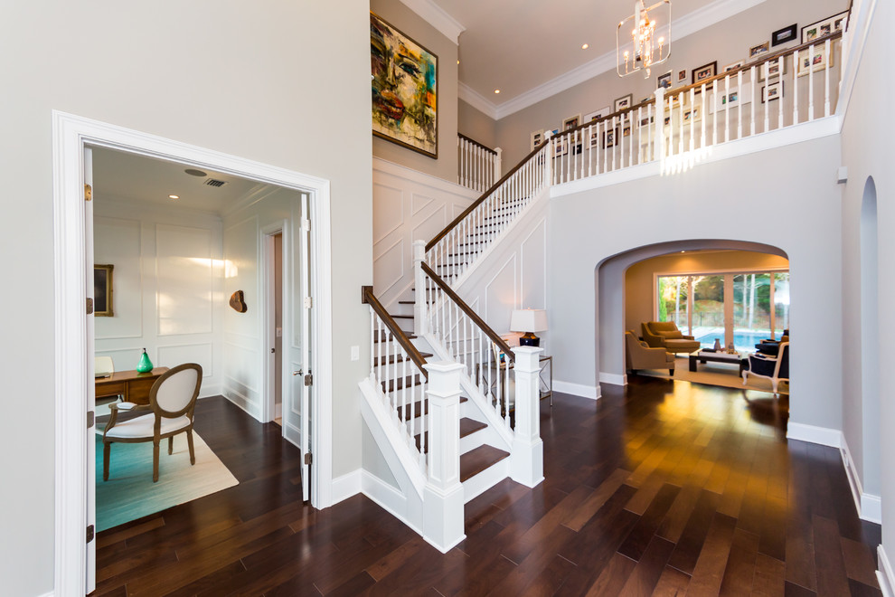 Inspiration for a large classic foyer in Jacksonville with grey walls, medium hardwood flooring and a single front door.