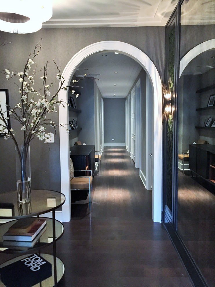 Example of a mid-sized eclectic dark wood floor entryway design in Nashville with gray walls and a dark wood front door