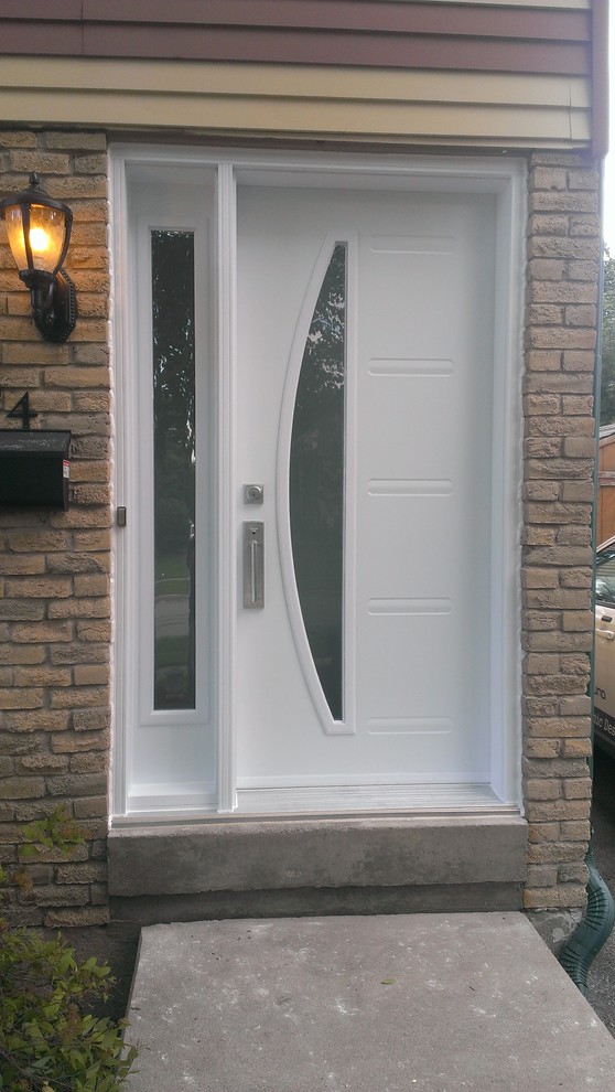 Inspiration for a contemporary entrance in Toronto with a single front door and a white front door.