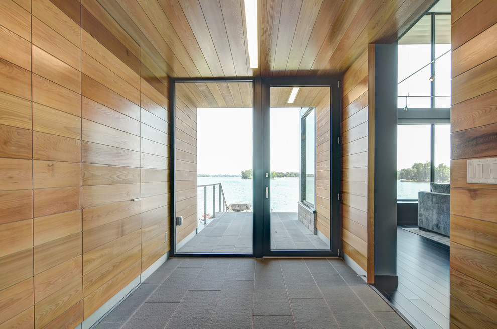 Contemporary entrance in Minneapolis with a single front door.