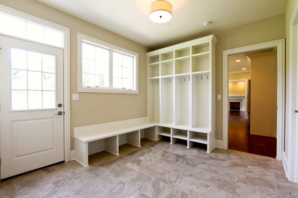 Inspiration for a medium sized classic boot room in Chicago with beige walls, ceramic flooring, a single front door, a white front door and feature lighting.
