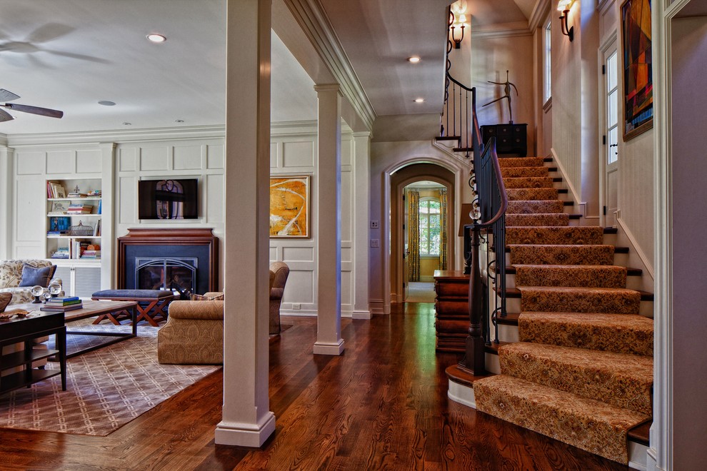 Inspiration for a timeless entryway remodel in Raleigh with white walls