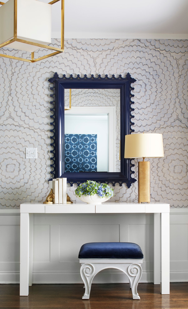 Example of a mid-sized transitional medium tone wood floor entryway design in Chicago with multicolored walls