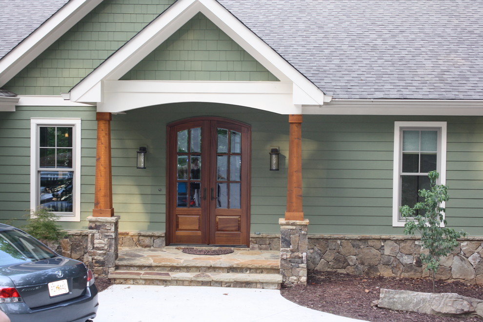 Inspiration for a timeless double front door remodel in Atlanta with a medium wood front door