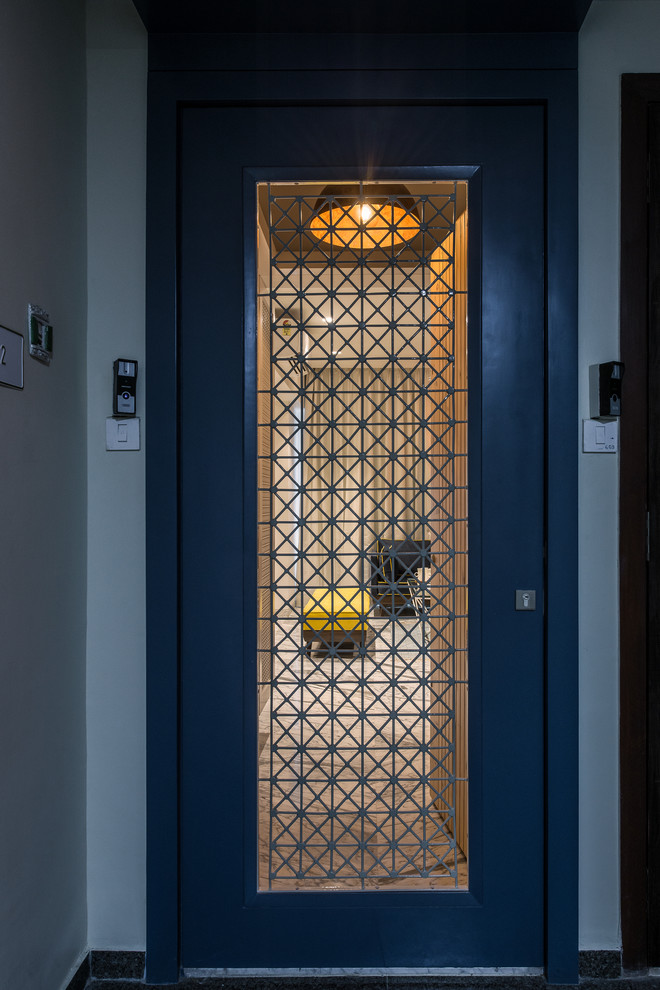 Inspiration for a contemporary entryway remodel in Mumbai