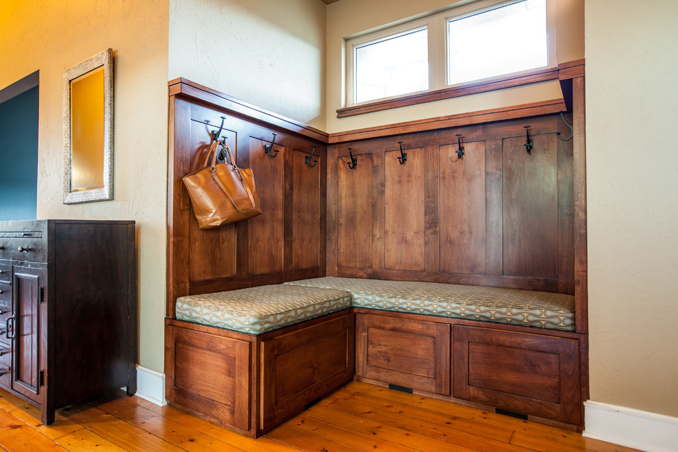 Photo of a medium sized classic foyer in Denver with beige walls, medium hardwood flooring, a double front door, a medium wood front door and yellow floors.