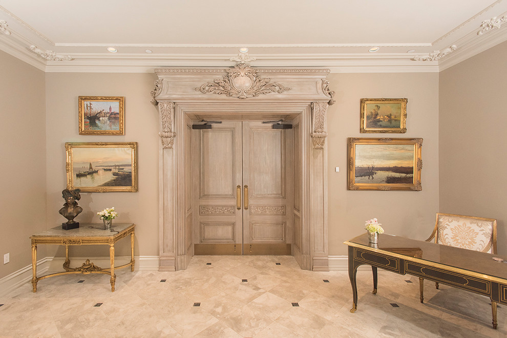Example of a large ornate linoleum floor and beige floor entryway design in New York with beige walls and a white front door