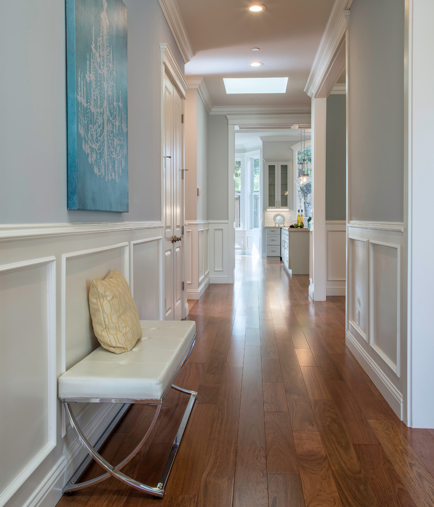 Inspiration for a large traditional hallway in San Francisco with grey walls, medium hardwood flooring, a double front door and a dark wood front door.