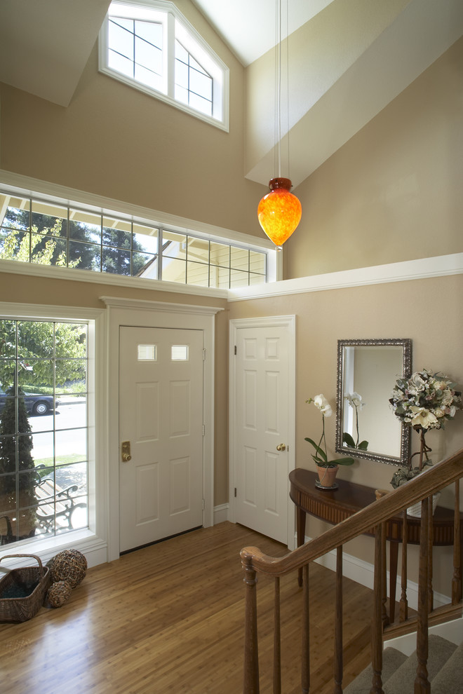 Elegant entryway photo in San Francisco with beige walls