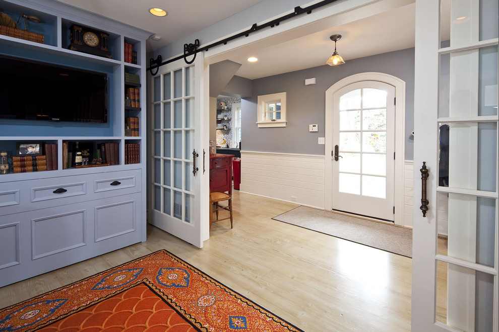 Inspiration for a timeless entryway remodel in Minneapolis with blue walls