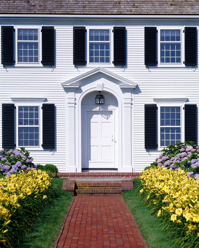 Inspiration for a classic front door in Boston with a single front door and a white front door.