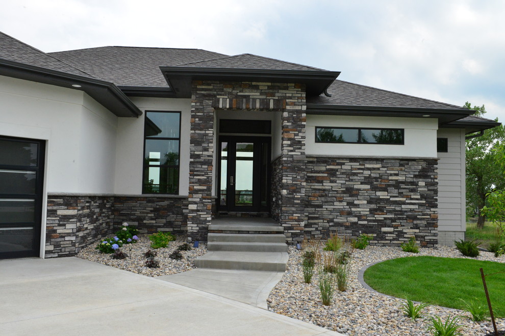 Expansive contemporary front door in Other with a single front door and a black front door.