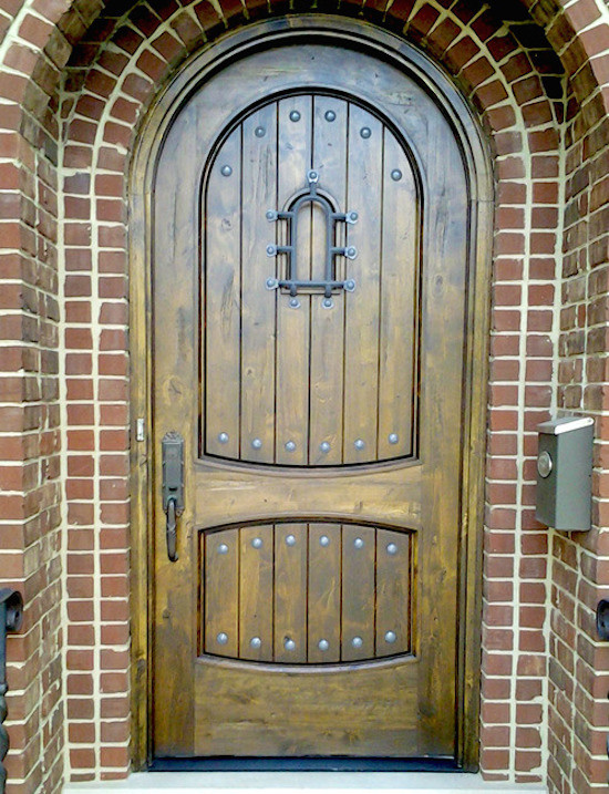 Entryway - mid-sized traditional entryway idea in Chicago with a medium wood front door