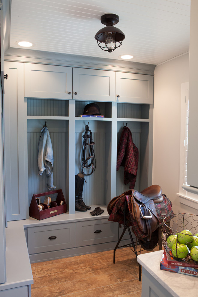 Inspiration for a small farmhouse mudroom remodel in Chicago