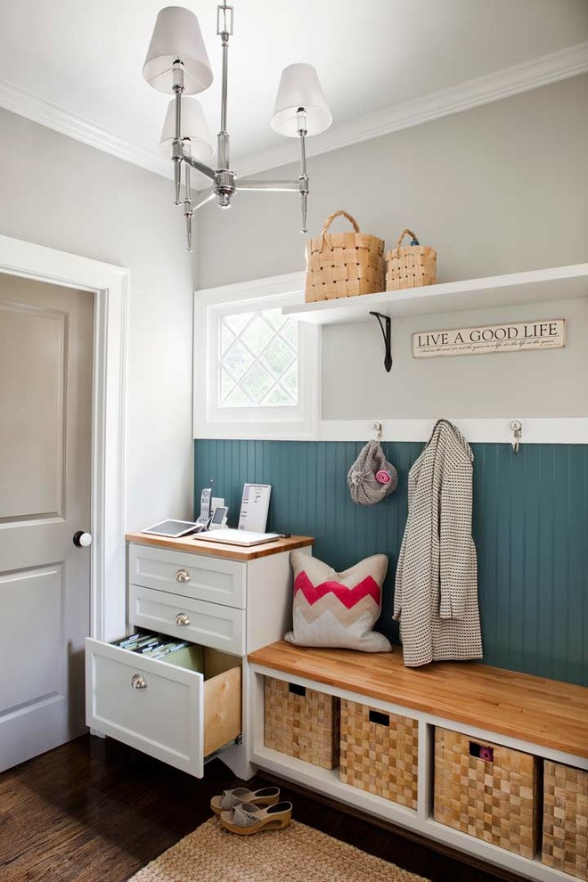 Inspiration for a mid-sized coastal dark wood floor mudroom remodel in Atlanta with gray walls