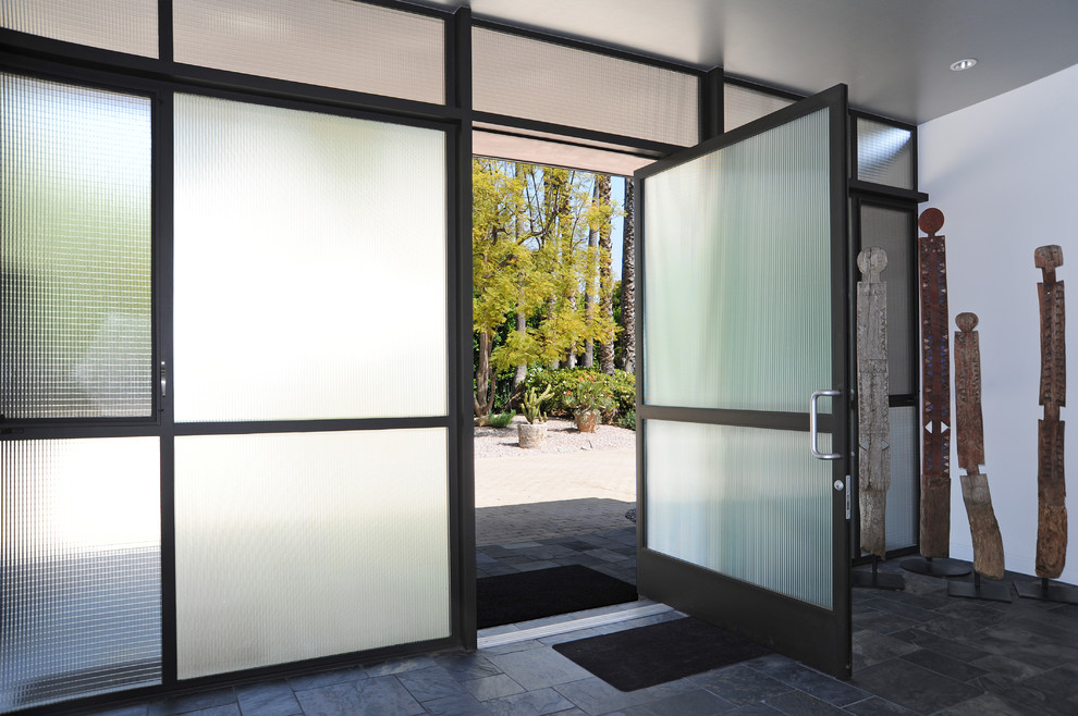Contemporary entrance in Boston with slate flooring.