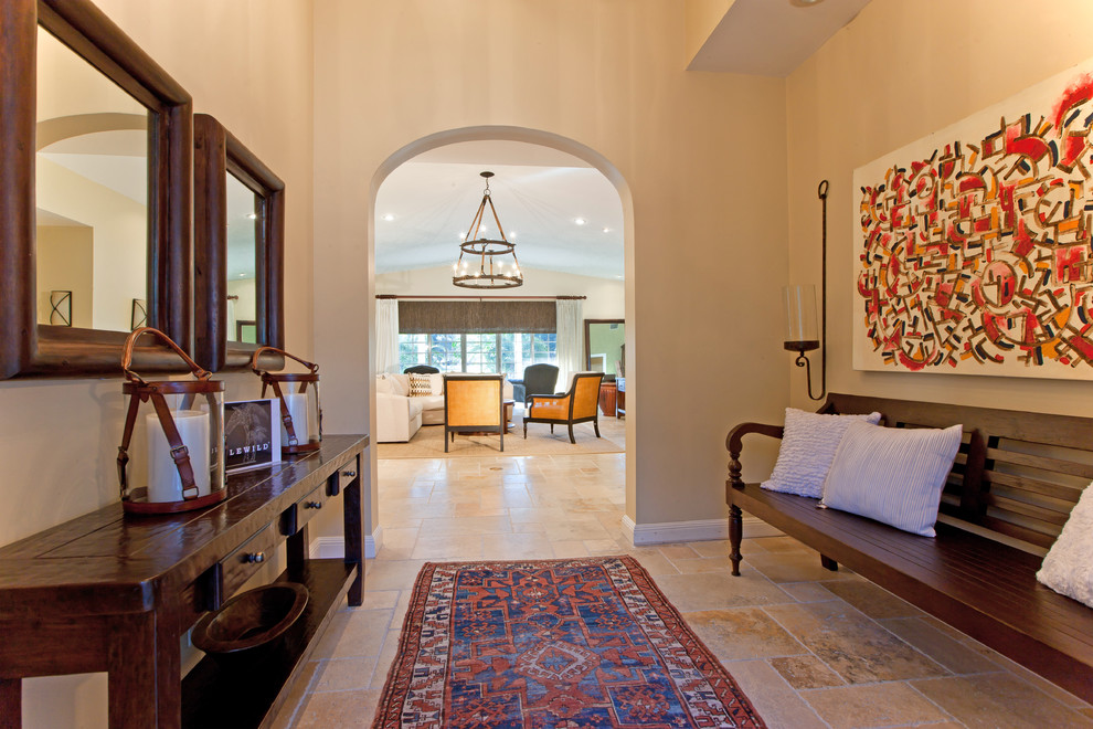Island style vestibule photo in Other with beige walls