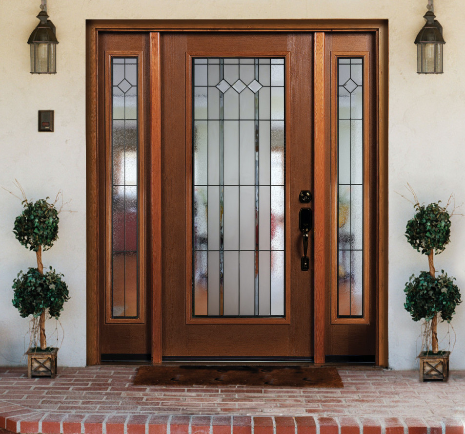 Example of a mid-sized classic entryway design in Vancouver with a dark wood front door