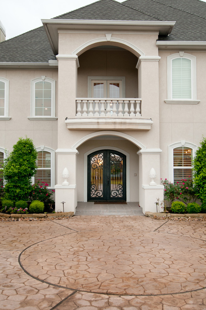 This is an example of a mediterranean entrance in Houston.