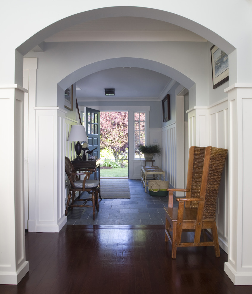 Example of a beach style dark wood floor entryway design in Providence
