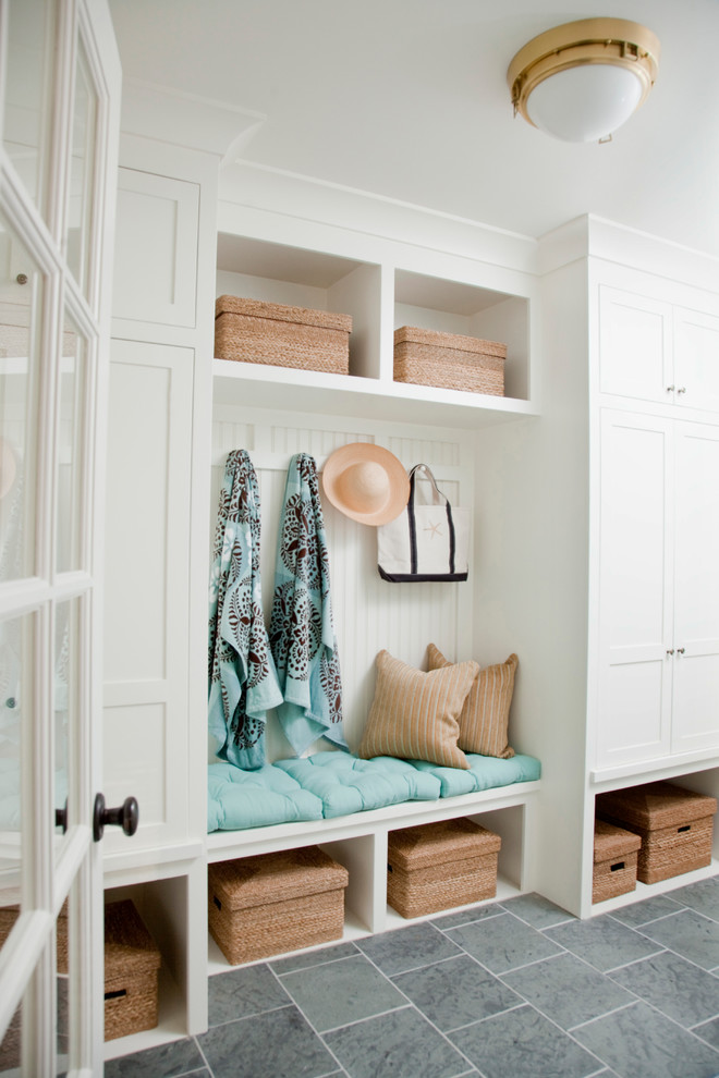 Design ideas for a nautical boot room in Providence with white walls and a glass front door.