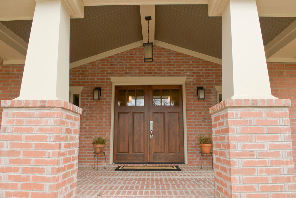 Medium sized classic front door in Dallas with blue walls, medium hardwood flooring, a double front door and a medium wood front door.