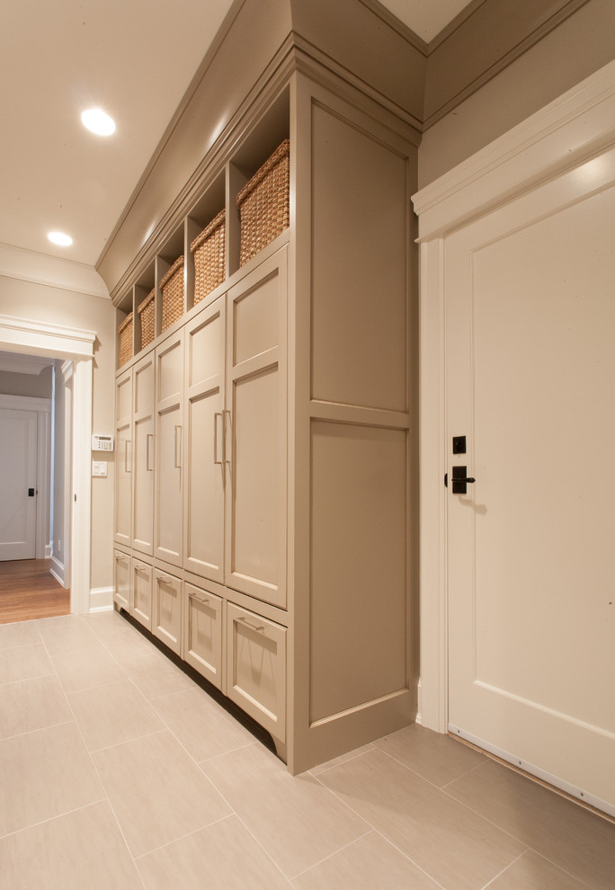 This is an example of a medium sized classic entrance in Vancouver with beige walls.