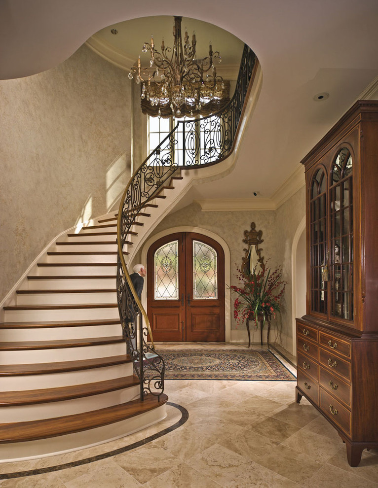Mid-sized elegant marble floor entryway photo in Raleigh with beige walls and a medium wood front door