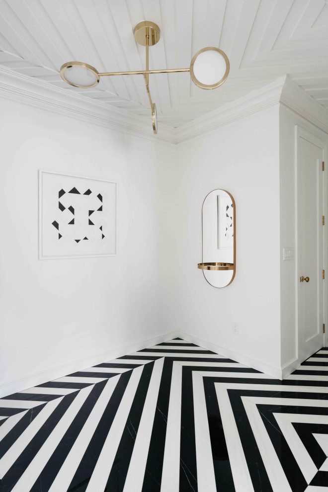 Inspiration för en mellanstor vintage foajé, med vita väggar, marmorgolv och svart golv
