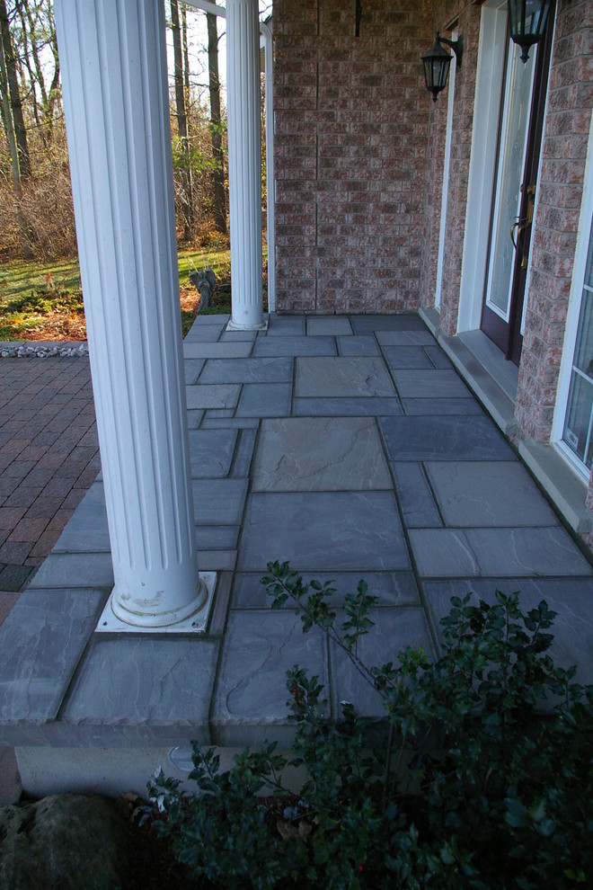 Flagstone Porch Craftsman Entry Toronto by STICKS & STONE