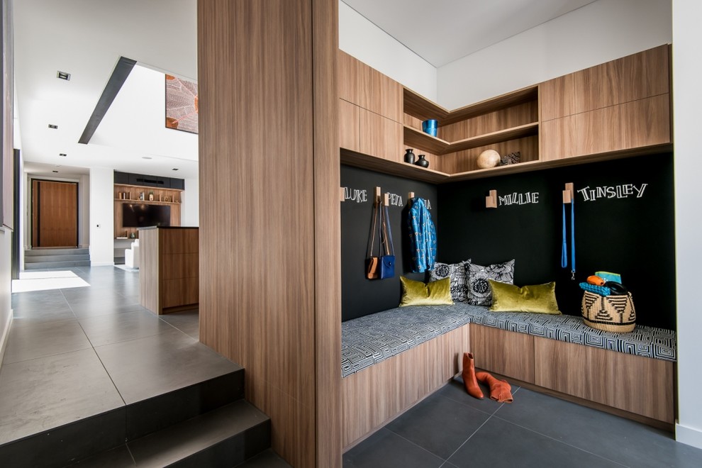 Contemporary boot room in Perth with white walls.