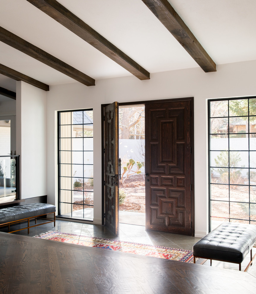 Design ideas for a large midcentury foyer in Denver with white walls, slate flooring, a double front door, a dark wood front door and grey floors.