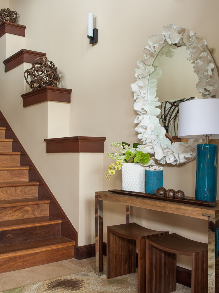 Inspiration for a mid-sized eclectic porcelain tile entryway remodel in Hawaii with beige walls